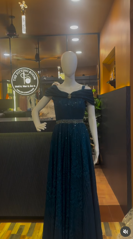 Teal off-shoulder evening gown